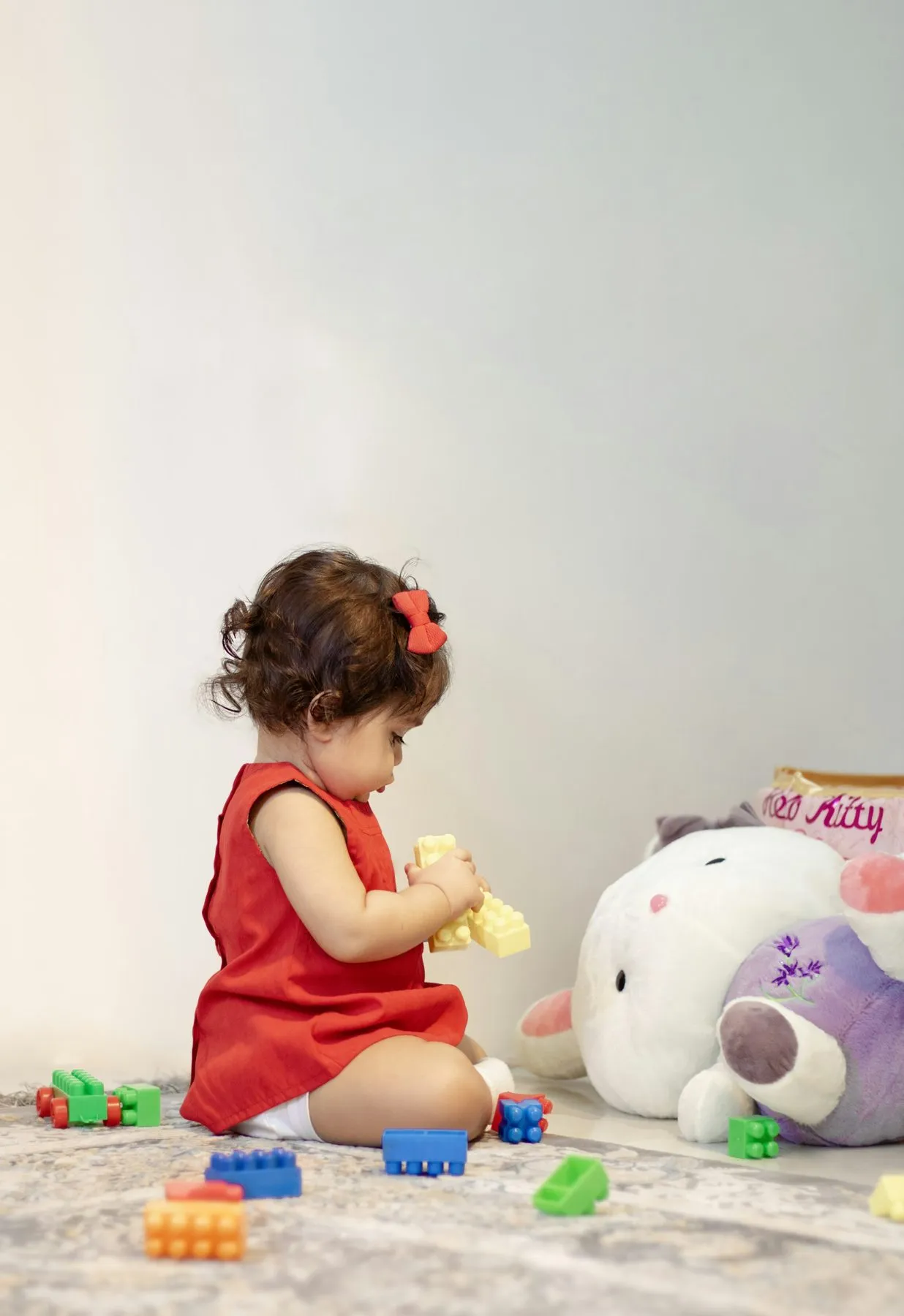 Toddler playing with toys